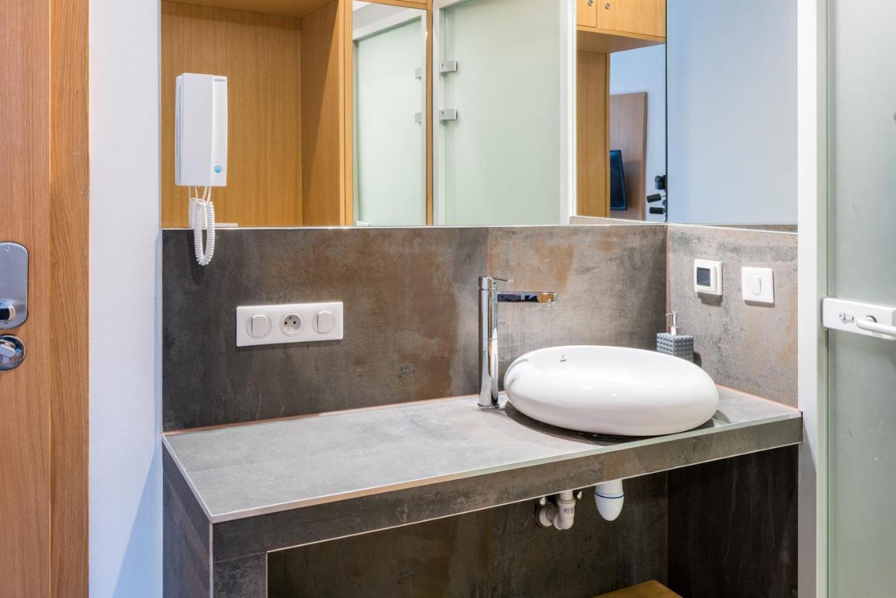 Tcz Wozna Aparthotel พอซนาน ภายนอก รูปภาพ